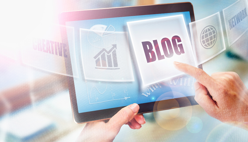 Photo of a digital screen saying blog